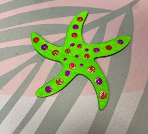 Painted wooden sea star